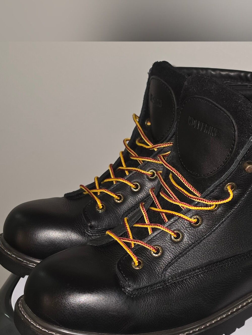 Wolverine Black Leather Work Boots with Red and Yellow Laces